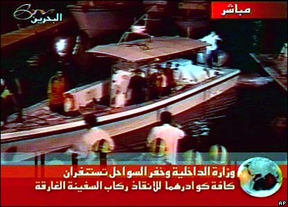 Televisi lokal menayangkan gambar-gambar pertama upaya pertolongan