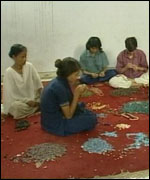 women beading