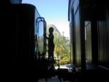 My son pretending he is taking the old train