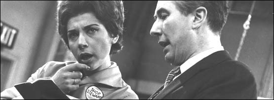 Someone speaking to a shop assistant