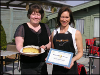 Sandy de Rougemont of ‘The Twig and Spoon Bistro’ with farmer Ilene Woods who provides the eggs, receiving Eggselnce Award