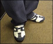 Trainers, posing as dancing shoes