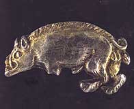 silver livery badge in the shape of a boar
