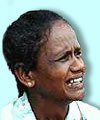 A woman crying over relatives lost in Sri Lankan civil conflict