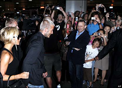David and Victoria Beckham arrive at LA airport