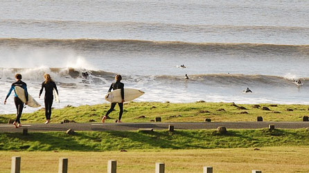 Surfers at Rest Bay by Martin Aaron
