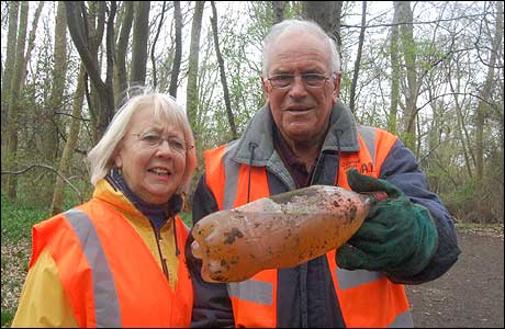 Keith and Joy Harris with a bottle of urine