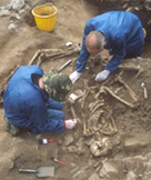 Photo of archaeologists working at the dig