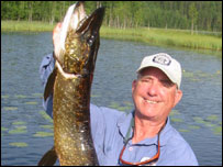 Martin James with a pike