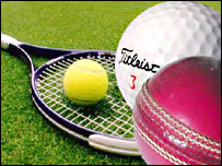 Different sports balls and racquets