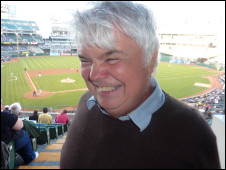Peter White recording Blind Man Roams the Globe at a baseball game in San Francisco, US