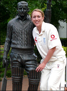 Rosalie Birch with a statue of Bradman