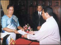 Dissanayake being sworn-in by Kumaratunga 