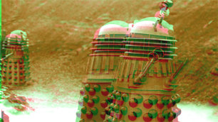 A 3D dalek with the familiar green and red halos arounnd it