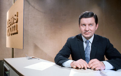 Richard Baker reading news