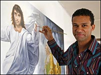 Michael Browne with his George Best painting