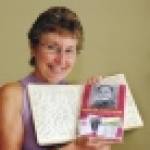 Albert's daughter, Maggie Clifton with the new book and the original diary, transcribed word-for-word