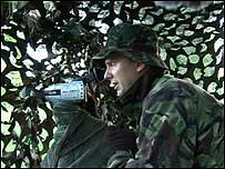 Wildlife watcher in camouflage