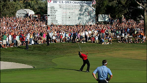 Lee Westwood looks on as Tiger Woods forces a play-off