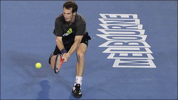 Andy Murray practices in the Rod Laver Arena in Melbourne