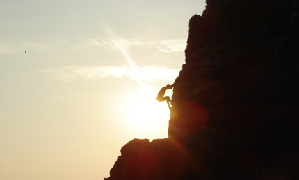 Island Adventure. Mark brought the wee sticky boots and found a few nice vertical routes to the top. Pic: Nick 06