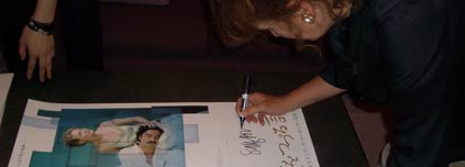 Sally Potter signs a copy of the Japanese Yes poster