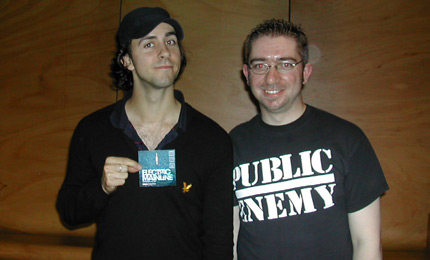 Paul Smith of Maximo Park proudly show's off his Electric Mainline free merchandise.
