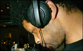 A young man wearing headphones