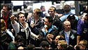 Traders work in the Euro Dollar pit at the Chicago Board of Trade