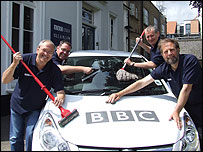 presenters cleaning the BBC Essex car
