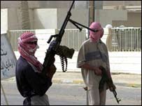 Повстанці під час одного з нападів у місті Рамаді