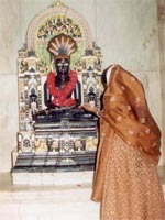 Jain woman worships