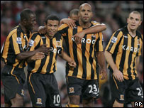 Hull City celebrate their second goal against Arsenal