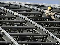 Tốc độ tăng trưởng cao của kinh tế Trung Quốc như mái nhà cao khó leo xuống