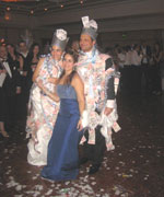 Money is pinned to newly weds at Greek weddings