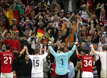 Germany's players celebrate their 2-1 victory in front of their fans at Wembley
