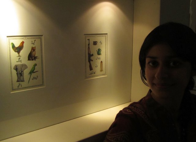 Sara Khan, with two of her 'qaidas' - the Pashto word for alphabet books for children. The Pashto for parrot is pleasing: shandoddi.