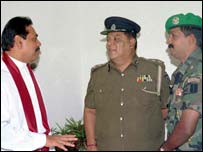 PM Rajapakse with security officers