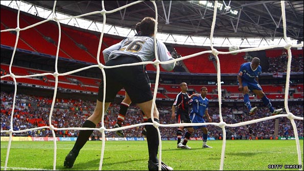 Simeon Jackson scores Gillingham's winner against Shrewsbury