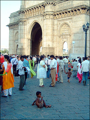 Beggar-child at the Gateway of India in Mumbai