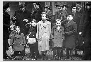 children and parents waiting to say goodbye