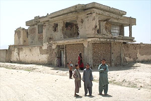 "Home sweet home". Families still live in the bomb-out remains of one of Kabul's wealthiest suburbs
