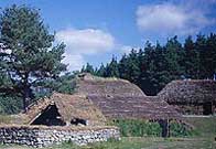 Photograph showing a reconstructioned scene of a Highland townhip before the Clearances