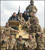 Soldiers with Toby and Terry around a Saxon