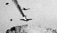 A German plane crashes to earth after a British hit during the airborne invasion of Crete