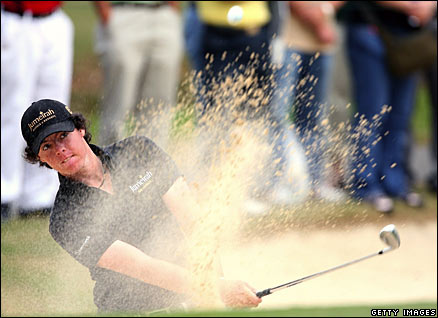 Rory McIlroy chips from the bunker on his final round of the Dubai Classic