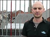 Dan Brown on top of a large building in Hereford
