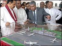 President Rajapaksa with Samaraweera (C) and Tiran Alles, owner of Mawbima newspaper