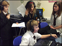 School pupils recording a report
