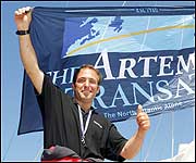 Alex celebrates his sixth place finish